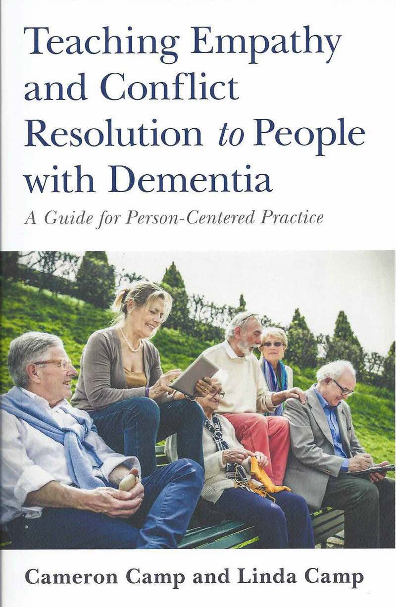 Cover of Teaching Empathy and Conflict Resolution to People with Dementia, showing a photo of 5 people sitting together in a park